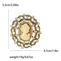 Vintage cameo brooch with elegant lady portrait and crystal accents in golden finish - Gold