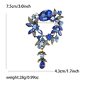 Elegant gold vintage brooch with blue rhinestones and water drop pendant, 7.5cm tall - Blue