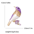 Purple enamel bird brooch with floral branch detail, height 4.3cm and width 2.9cm - Purple