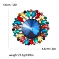 Vintage runde Strass-Blumenbrosche mit bunten Kristallen und blauem Mittelstein - Bunt