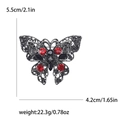 Vintage zilveren vlinderbroche met rode en zwarte strasstenen, maat 5.5cm x 4.2cm - Zilver