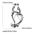 Vintage silver couple embrace brooch with red enamel flowers and crystal accents - Silver