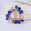 Broche vintage dorado con cristales de gota azul oscuro y diamantes de imitación - Azul Tinta