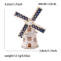 Detail view of the enamel windmill brooch with dimensions 4.2cm by 2.8cm and weight info - Blue