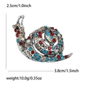 Retro snail brooch with colorful rhinestones in silver alloy, size 3.8cm by 2.5cm - Colorful