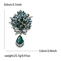 Vintage Blumenbrosche in Gold mit smaragdgrünem Kristall-Tropfen und blauen Steinen - Blau 1346-BL