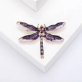 Elegante spilla a libellula dorata con ali in smalto viola e accento in cristallo - Viola
