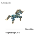Golden unicorn brooch with blue and green rhinestones, dimensions 6.8x7.2 cm - Blue