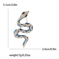 Golden snake brooch with dark blue enamel, white rhinestones and size specifications - Blue