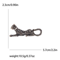 Élégante broche léopard en émail noir avec des accents dorés et des strass étincelants - Noir