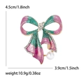 Spilla a fiocco scintillante con sfumatura rosa e verde, strass e perla bianca pendente - Rosa
