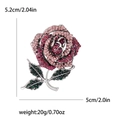 Elegante spilla a forma di rosa con strass rosa brillanti e dettagli di foglie verdi - Viola