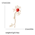 Spilla a forma di neurone dorata con smalto rosso e misure di dimensione visualizzate - Rosso
