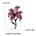 Elegant lily flower brooch with pink rhinestones and green stem measuring 7cm by 4.6cm - Pink