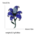 Blue lily flower brooch with rhinestones measuring 7cm in height and 4.6cm in width - Blue