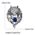 Spilla a testa di lupo argento con gemma blu e dimensioni di 4,8 cm per 3,2 cm - Testa di Lupo Argento Gemma Blu / Argento