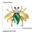 Spilla a forma di ape dorata con grande gemma verde a goccia e piccoli strass bianchi - Oro-Giallo