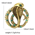 Spilla cobra retrò in lega d'oro antico con strass color smeraldo e trama a scaglie - Oro 1616-GD