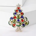 Detailed close-up of a Christmas tree brooch with colorful rhinestones and green enamel - Multi-color (MM-BR-1650)