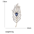 Spilla piuma dorata elegante con pietra a goccia blu e cristalli bianchi, 7,8cm - Forma di Piuma (Oro) / Oro