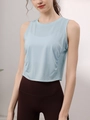 Slim fit light blue Tencel yoga tank top with side ruching and a crew neck design - S / Tops / Blue