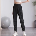 Pantaloni sportivi a vita alta in nylon nero da donna, ideali per yoga e allenamento - S / Nero