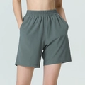 Women's high waist dark grey yoga shorts with elastic waistband and side pockets - Grey Green