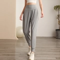 Women's high waist light grey sports sweatpants with elastic cuffs for yoga and running - L / Medium Grey