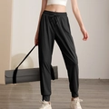 Women's high waist loose nylon sports joggers with pockets and ribbed cuffs in black - Black