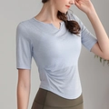 Slim fit light blue athletic t-shirt with v-neck and ruched side detailing for women - L / Blue