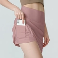 Women's high-waisted tennis skort with functional phone pocket in dusty pink color - Dusty Pink
