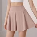 Gonna da tennis a pieghe a vita alta da donna in rosa polvere con tessuto elastico - S / Rosa Chiaro
