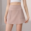 Women's lotus pink high-waist yoga sports skort with functional side pockets - S / Light Pink