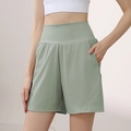 Light green high-waisted fitness shorts for women with functional side pockets - 4 (S) / Cardamom Green