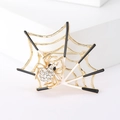 Detail of spider web brooch with sparkling rhinestones and black enamel finish - White (MM-BR-1683)