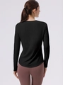 Top da yoga nero a maniche lunghe con cuciture piatte e vestibilità slim per fitness sport - S / Nero