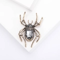 Broche araignée en or vintage avec grand cristal gris et yeux en pierres précieuses vertes - Gris