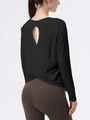 Top sportivo nero a maniche lunghe con motivo jacquard e design a schiena scoperta - Nero