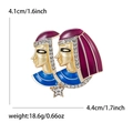 Detailed macro view of Egyptian enamel brooch with dimensions 4.1cm by 4.4cm - Purple