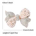 Broche nœud élégante en strass et perles, dimensions 5,5 cm largeur et 4,9 cm hauteur - Nœud (1754-GD) / Or rose