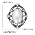 Detail van vintage zilveren broche met grote witte parel en afmetingen 3,5cm x 2,9cm - Zilver