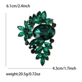 Luxurious vintage flower brooch with green gemstones and rhinestones, size 6.1cm x 4.3cm - Green