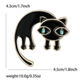 Spilla gatto in smalto nero con occhi in strass verdi, posa allungata, misura 4,5cm x 4,3cm - Nero 1626-BK