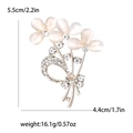 Elegant gold bouquet brooch with pink opal stones and white rhinestones on white background - Gold