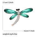 Detalle del broche de libélula mostrando dimensiones 4,2 cm x 3,1 cm y cristales verdes - Estilo Verde (MM-BR-1781绿色)