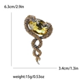 Spilla doppia vipera vintage dorata con cristallo giallo e dettagli dimensionali - Marrone