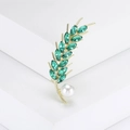 Elegant gold wheat ear brooch featuring green marquise crystals and a white pearl accent - Green