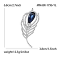 Elegante Federbrosche mit einem großen tiefblauen Wassertropfen-Edelstein und Kristallen - Silber