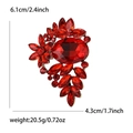 Vintage floral crystal brooch with red main stone and gold base, size 6.1 x 4.3 cm - Red