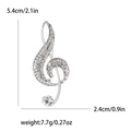 Silver treble clef musical note brooch with rhinestones and size measurements - Silver